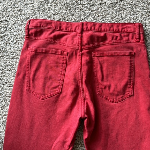 Muted red jeans. Waist is 15”, rise is 10” and length is 27” - Picture 6 of 7